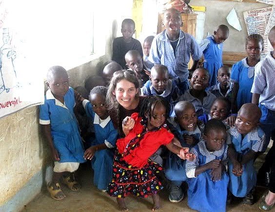 Jess with children at a Kenyan orphanage